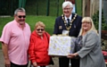 Rick and Barbara Todd are presented with a ‘thank you’ gift by Mayor Ian Duckworth and Greave Community Base secretary Dawn Fairclough