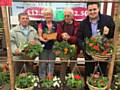 Clifford Barron, Shirley Wilkinsin, Neil Chadwick and Councillor John Blundell with some of of the hanging baskets soon to brighten up Firgrove