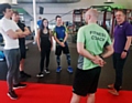 Shannon Wilson and other Hopwood Hall students meet with Jake French and David Lloyd Fitness Coaches