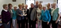 Councillor Peter Rush, volunteer’s and visitors celebrate the 20th Anniversary of the Heywood Blind Centre