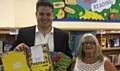 Councillors John Blundell and June West at a 'Read and Feed'  Library