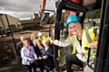 Madeline De Souza (R), Deputy Mayor of Whitworth, visits the new Whitworth Care development, alongside residents’ families and staff