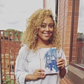 Jade Stuart with her debut book, 'The Ink In My Scars'.