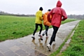 Runners in rain