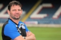 Assistant Manager Chris Beech has committed his long-term future to Rochdale AFC