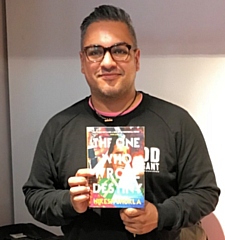 Nikesh Shukla with his book