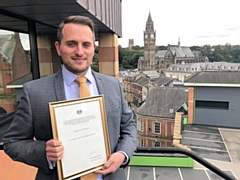 Richard Michael Dobson-Mason with his Certificate of Appointment