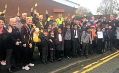 Children from Broadfield School help start Becky Want on her sponsored walk for Children in Need