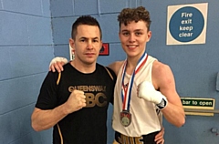 Joseph Crawford kicked off the boxing season retaining two 2017 championship titles