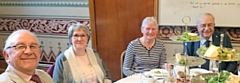 Iain and Margaret Wight (left) who helped start the Foodbank and guests celebrate six years of operation at Rochdale Town Hall 