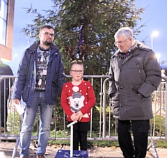 Gracie McDermott with Rochdale MP Tony Lloyd on hand to assist the countdown to the switch on Kirkholt Christmas lights