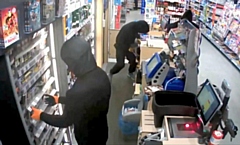 CCTV of armed robbery at Co-op on Rooley Moor Road, Rochdale