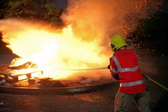 Firefighters putting out a fire