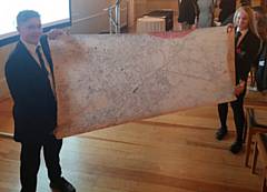 Jake Idiens and Jenna Holt created an award-wining project about World War One, consisting of a 1918 map of Rochdale with 1,486 poppies (seen here with a smaller version)