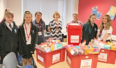 Anna Stokes (centre) with members of Matthew Moss Red Box Project