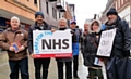 Rochdale MP Tony Lloyd and Labour Party members show their support for the NHS