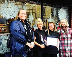 Owner and Manager of Silhouette, Bev Fielding with her staff and Liz McInnes MP