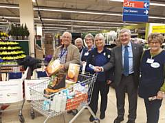 Tony Lloyd and Foodbank volunteers at last year's food collection at Tesco in Sudden