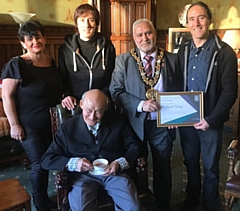 Mayor Mohammed Zaman with Richard Tang with his brother and father