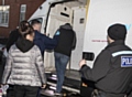 13 arrested in raids