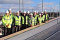 Guests at the topping-out ceremony on The Strand