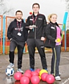 Scott Hardy, Matthew Howells and Aleksandra Savina at the Darnhill estate in Heywood