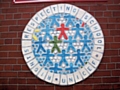 Ceramic displays featuring the Unicef and Rights Respecting Schools Award logos at Castleton Primary School