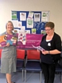 Tracey Dixon, gynaecology oncology Macmillan clinical nurse specialist and Audrey Guy, Macmillan admin support, with some of their literature. 