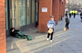 Milnrow Cricket Club juniors distributed food to the homeless in Manchester, seen here in Piccadilly 