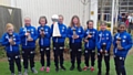 The Rochdale U10 girls with their trophies: L-R Grace Foster, Phoebe Clark, Poppy Madden, Eva Williamson , Kyra Matthews, Gracie-May Smith, Cienna Williams, Siri Penney