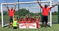 Shawclough U7 A with coach/manager Malc Grimwood (left) and coach Des Mandivenga (right)