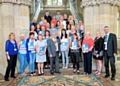 The Mayor, Councillor Mohammed Zaman, with all winners on the town hall steps.jpg