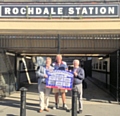 Rochdale MP Tony Lloyd outside Rochdale Train Station 