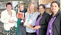 Councillor Janet Emsley (left), cabinet member for libraries, with council library staff