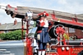 Official Blackpool Town Crier, Barry McQueen, arrives on a classic fire engine to officially open the event