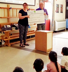 Mrs Heather Edge, Ashfield Valley Primary School Headteacher, with Peter Williams, co-founder of Drumbeat Children's Foundation