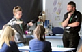 Former student Milly Whitaker speaking to Whitworth Community High School students to promote Women in Engineering Day, with her boss John Hanson from Hanson Springs Ltd