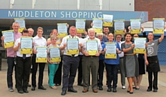 Councillor Phil Burke, a Middleton councillor and the council’s transport spokesman, with Councillor Allen Brett, leader of the council, and local businesses and supporters 