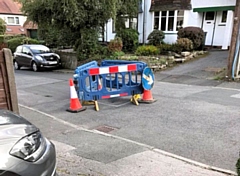 Barriers have been installed around the cavity, which is threatening to become a sinkhole