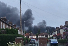 Thick plumes of smoke, seen from Boarshaw