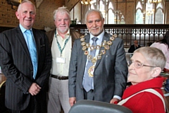 Councillor Ashley Dearnley, Mayor Mohammed Zaman, Leader of the Council Allen Brett and one of Shopmobility's longest members, Pauline Holt