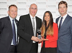 Andy Turner and Toni Carter (centre) receiving the award for Macro Employer 