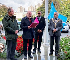 Steve Cooke speaks at the Flag Raising Ceremony for International Day of Peace