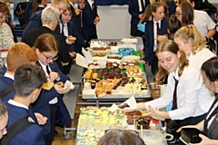 Whitworth Community High School’s charity group holding their Macmillan Coffee Morning