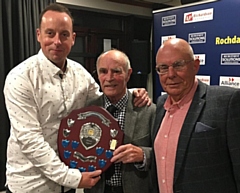 Former Rochdale captain Peter Fletcher (centre) presents the professional’s Player of the Year Shield to Steve Oddy, watched by Alistair Bolingbroke