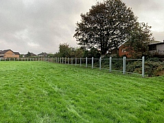 The new fence on the playing fields