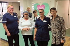 (Front left to right): Natalie Hallard (chemotherapy outreach nurse), Beverly Haigh (patient), Liz Kings (senior sister) and Pauline Nixon (patient); (Rear left to right): Receptionists Karen Fielding and Patricia Radcliffe