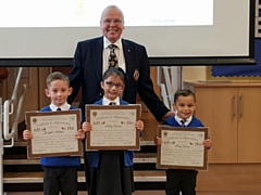 Ruby Dean, six, her little brother Rory, four, and best friend Joseph Ashton, five, were presented with certificates by Harry Hawksworth, Club Treasurer of Littleborough & District Lions