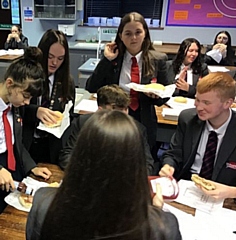 Form 11F celebrate almost 100 per cent attendance with bacon and sausage butties