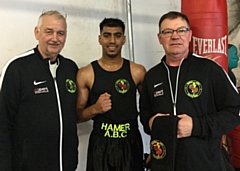 Monir Miah (center) from Hamer Boxing Club with his coaches Alan Bacon and Steven Connellan